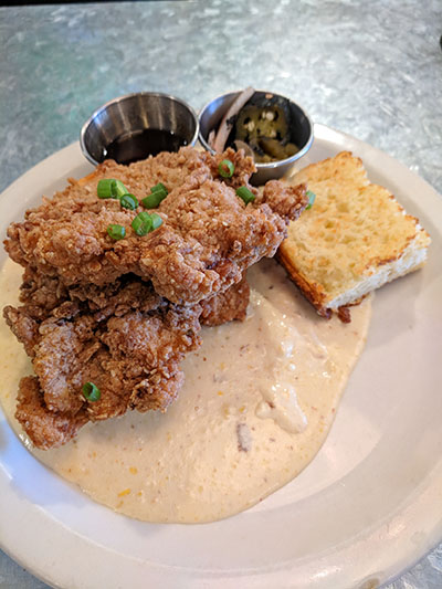 Phoebe's Diner signature dishes Smoked Brisket BenedictShrimp and GritsPhoebe's Patty MeltFried Chicken and Waffle